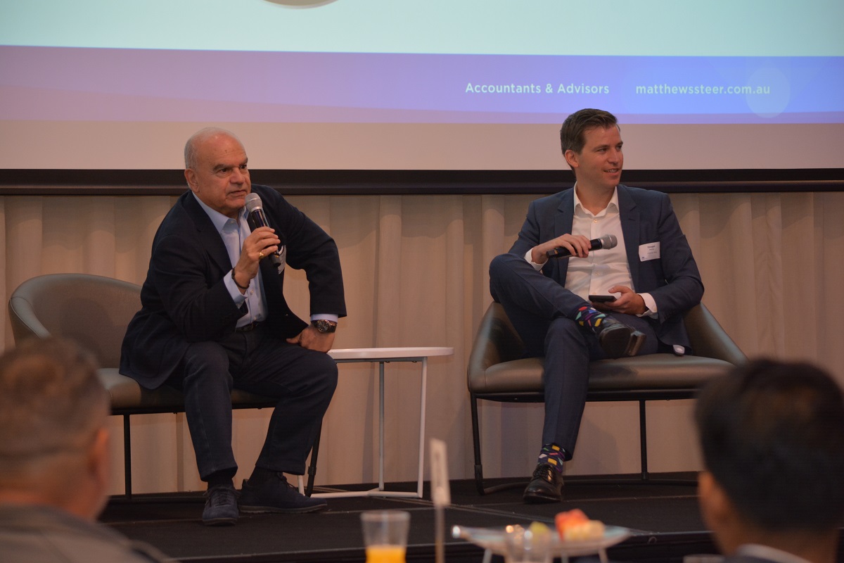 Tony De Domenico, Bertocchi and MC Dougal Beatty at Matthews Steer Success Stories Breakfast